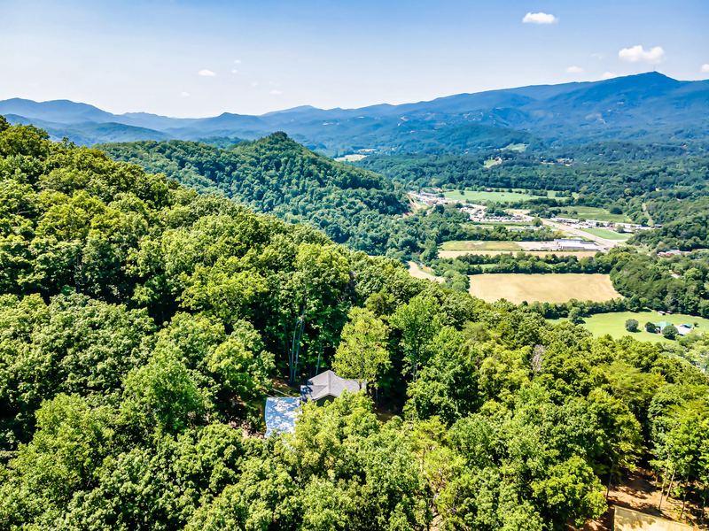 Summer aerial view from above the cabin toward a valley and the Smoky Mountain ridgeline