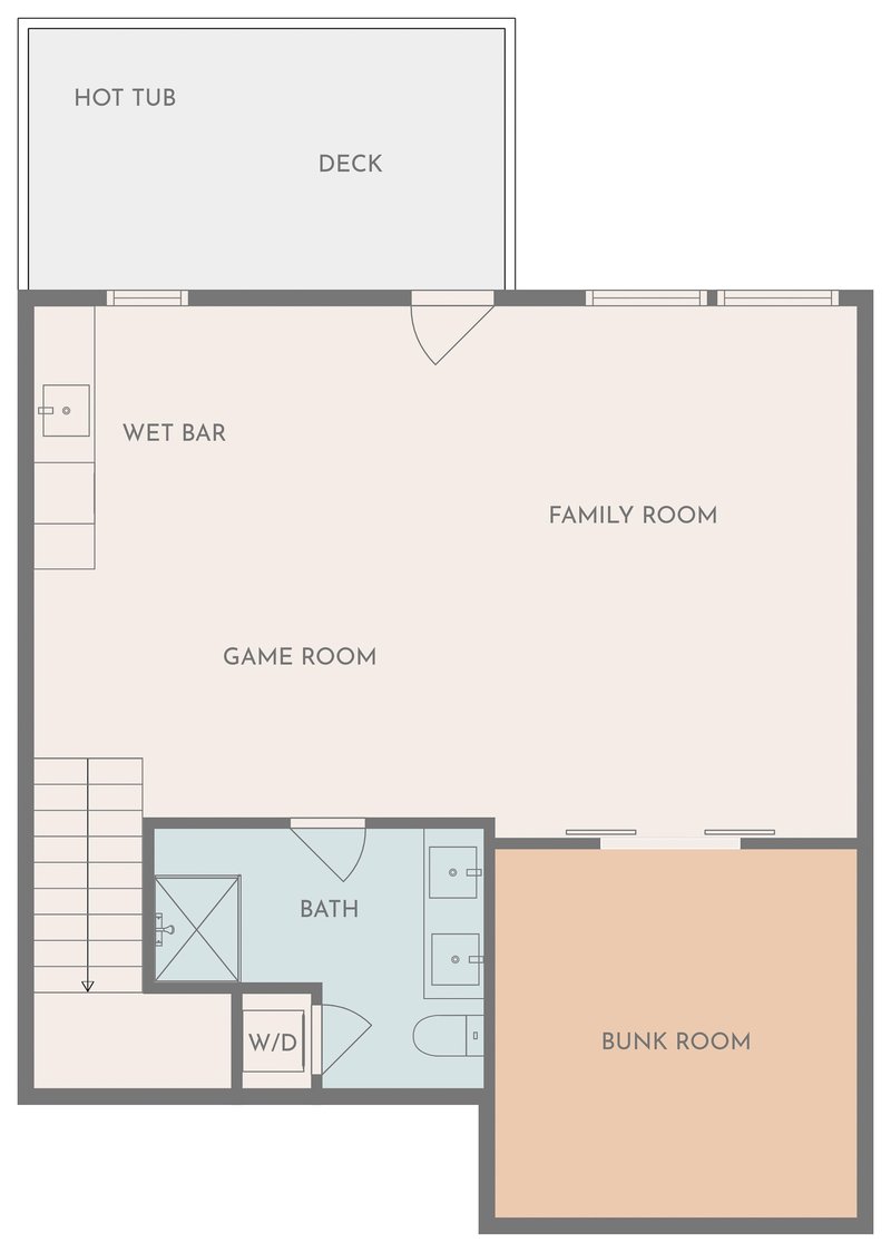 Lower-level floor plan: game room with wet bar, family room, bunk room, bathroom with washer and dryer, and the deck with the hot tub